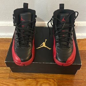 Air Jordan 12 Retro 5.5 kids (7.5 women’s) black and red. In good condition.